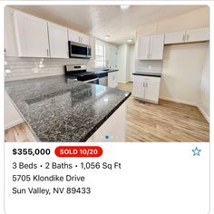 a kitchen with white cabinets and granite counter tops for $ 350, 000 sold 1040