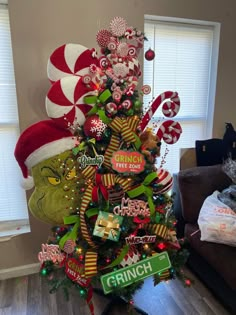 a christmas tree decorated with candy canes and candies