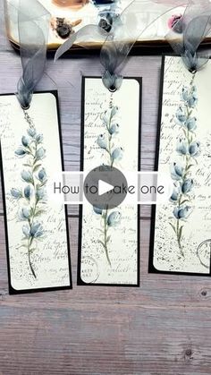 four tags with flowers on them hanging from a skateboard