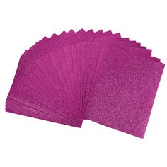 six purple glitter paper sheets are stacked on top of each other, with one in the middle