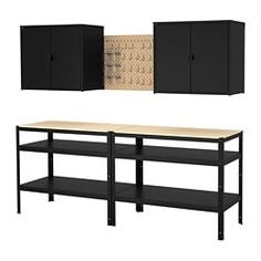 a black shelf with two cabinets next to it