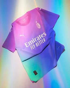 a soccer jersey with the word emirates fly better on it is shown in multi - colored light