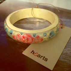 Hand Painted Vintage Inspired Wooden Floral Bangle This gorgeous wooden bangle features a blue and pink hand painted floral design.  It's new with tags!   No trades. Hearts Jewelry Bracelets Spring Gift Bangle, Hearts Jewelry, Wooden Bangle, Wooden Jewelry, Price Drop, Blue And Pink, Jewelry Vintage, Floral Painting, Womens Jewelry Bracelets