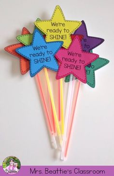 four star shaped straws with writing on them that say we're ready to shine