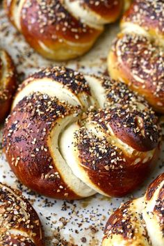 freshly baked bagels with sesame seeds and poppy seed sprinkles