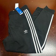 Adidas Mens Black 3-Stripes Slim Fit Tapered Leg Pockets Jogger Pants Size L Xxl Brand: Adidas Department: Men Size: L & Xxl Color: Black Type: Pants Style: Jogger Pattern: Striped Theme: Sports Occasion: Activewear Season: All Season Features: Pockets, Adjustable Waist, Comfort Condition: New With Tags I Offer Discounts For All Return Customers. - Jvs Cotton Sports Bottoms With Three Stripes Branding, Cotton Sportswear Bottoms With Three Stripes Branding, Cotton Sportswear Bottoms With Three Stripes, Sporty Cotton Pants With Three Stripes, Black Sportswear Bottoms With Contrast Stripes, Black Pants With Contrast Stripes For Streetwear, Black Casual Sweatpants With Contrast Stripes, Black Casual Adidas Bottoms, Casual Black Adidas Bottoms