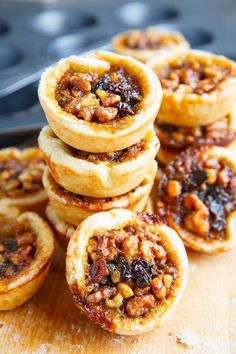 several small pastries stacked on top of each other with raisins in the middle