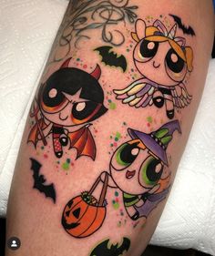 an image of halloween tattoos on someones leg that is wearing different costumes and colors