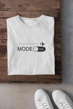 "ABOUT OUR:  Airplaine Mode tee 👉 Unisex T-shirt - Light fabric (4.2 oz/yd² (142 g/m²) - Retail fit - Tear away label - Runs true to size - 100% Airlume combed and ringspun cotton  - Soft cotton and quality print make users fall in love with it over and over again.  - These t-shirts have-ribbed knit collars to bolster shaping. - Printed and shipped from the USA CARE INSTRUCTIONS - Wash inside out with like colors. - Tumble dry or hang to dry. - Try not to iron directly over the design. Iron if necessary!  HOW TO ORDER  1) Please, check and review all photos  2) Choose your sweatshirt or t-shirt style, color, and size 3) Click add to cart. You can go back and follow the same steps to add more items to your cart 4) Click \"Proceed to check out\"  5) Add your shipping address and choose your Camping Tshirt, Travel Tshirt, Family Trip, Vacation Shirts, Travel Adventure, Family Travel, Print Making, Light Fabric, Unisex T Shirt