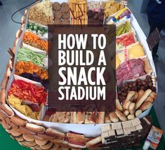 a large basket filled with lots of different types of snacks on top of a table