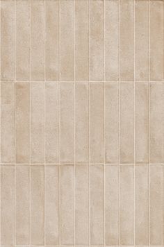 a beige tile wall that is very clean and ready to be used as a background