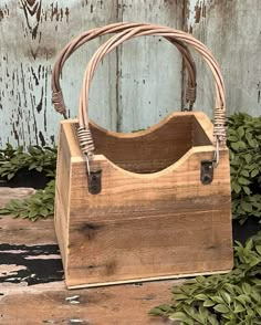 a wooden purse with handles on top of it