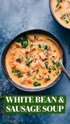 two bowls filled with soup on top of a blue table next to bread and vegetables