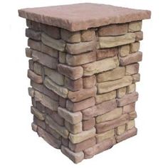 a stone pillar made out of bricks on a white background