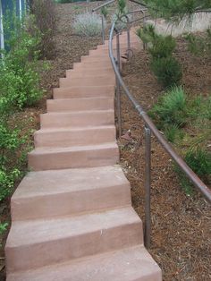 a set of stairs leading up to the top of a hill