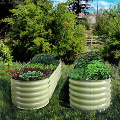 two large garden tubs are in the grass