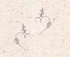 two small flowers are drawn on a piece of paper with the words love written in it