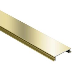 a gold colored metal strip on a white background