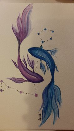 a drawing of two blue and purple fish in the shape of a zodiac sign with stars