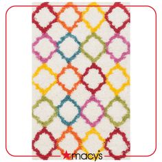 a multicolored rug with an abstract design