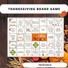 a thanksgiving board game with pumpkins and corn