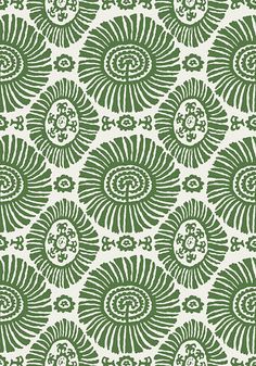 a green and white pattern on fabric