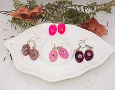 Blooming Beauty Earrings - 4 Pairs of Light Oval Dangles with Clay flower Charms by CnJCreationsbyHand on Etsy Hypoallergenic Purple Flower Drop Earrings, Purple Flower Shaped Earrings, Purple Pressed Flower Drop Earrings, Purple Flower-shaped Pierced Earrings, Spring Flower-shaped Purple Earrings