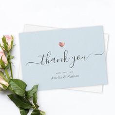 thank you card with pink roses on top and the word'thank you'written in cursive font