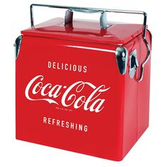 an old fashioned coca - cola cooler with the words delicious, refreshing on it's side