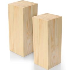 two wooden blocks sitting next to each other