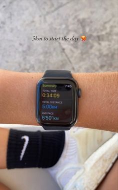 an apple watch on someone's arm with the time running and 5 00 pm