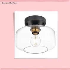 an image of a light fixture with a pink background