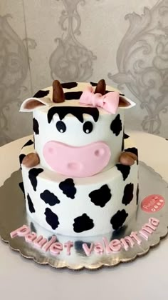 a birthday cake with a cow design on it