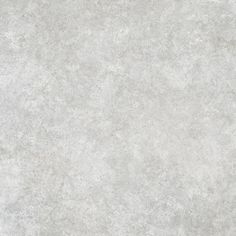 an image of a white tile wallpaper with grey grungy paint on it