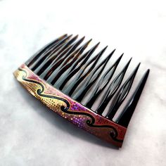 Japanese traditional comb, comb hairpin, gold lacquer inlay and mother-of-pearl inlay, wave design, maki-e bekko A flowing wave pattern. Gold Maki-e and mother-of-pearl inlay give a beautiful shine. The curved shape of this item is perfect for tying up your hair. It can be worn with kimono, Western-style clothing, or everyday wear. Size: approx. 7.3 x 4.7 cm Roughly measured. This is a beautiful hairpin, but we asked a craftsman to finish and polish it for the purpose of exhibiting it just in case. This is a genuine Bekko product without a doubt. The tortoiseshell is shiny and smooth. It is very light and comfortable to wear. 【Important】 ★We always send the item with a tracking number. So please place an order without any concern on delivery. You can always track the delivery status. ★Ship Western Style Outfits, Pearl Inlay, Wave Design, Wave Pattern, Tortoise Shell, Western Style, Japanese Traditional, Western Fashion, Just In Case