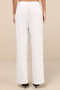 Shoutout to all the girlies who are going to look so posh this season in the Lulus Chic Viewpoint White Pinstriped Straight Leg Trousers! Lightweight stretch-woven fabric, with a classic pinstriped design throughout, shapes these must-have pants that feature a high, banded waist with belt loops and a top button closure above a hidden zip fly. The sleek, straight-fit pant legs feature a decorative welt pocket at the back and finish at fall length hems. Pair with the matching vest for a complete l Elegant Pinstripe Straight Leg Dress Pants, Going Out Pants, Elegant Pinstripe Straight Leg Pants, Fitted Pinstripe Straight Leg Dress Pants, Classic Pinstripe Straight Pants, White Straight Leg Pants With Button Closure, Straight Fit Pants, Straight Leg Trousers, Woven Fabric