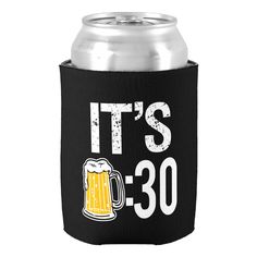 a can cooler with the words it's 30 on it and a mug in front