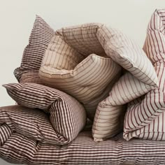 several pillows stacked on top of each other