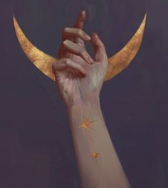 a woman's hand holding up the moon with her fingers and stars painted on it