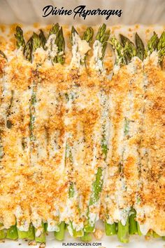 a casserole dish with asparagus and parmesan cheese on top