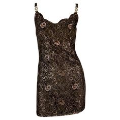 Introducing a stunning brown lace Gianni Versace dress, designed by Gianni Versace for his Fall/Winter 1996 collection. This exquisite dress showcases the same intricate lace-overlay design prominently featured on the runway. The understated brown slip is elevated by a copper metallic lace exterior. Completing the ensemble is a low back and clear Versace Medusa emblems adorning the straps. Explore our storefront for more rare Versace treasures! Approximate measurements: Size - 40IT/6US Bust: 32 Versace Vintage Dress, Vintage Versace Dress, Versace Mini Dress, Gianni Versace Dress, Blumarine Dress, Versace Gown, Tv Show Outfits, Versace Dress, Versace Couture