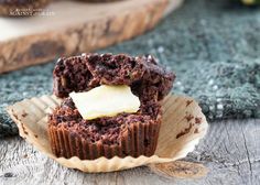 a chocolate muffin with butter on top