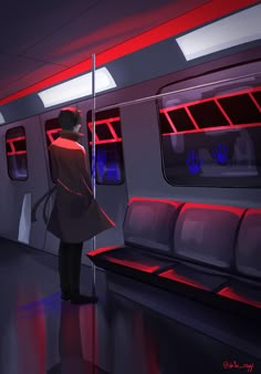 a woman standing on a train looking out the window at something red and blue in the distance