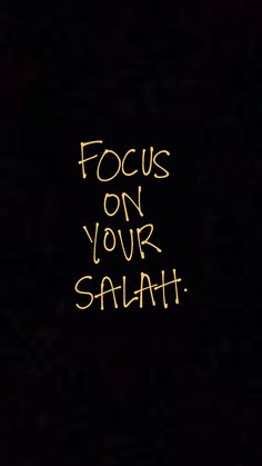 the words focus on your salvation are written in yellow chalk against a black background with an orange outline