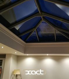 a room that has a glass roof in it