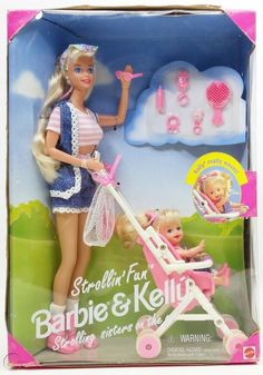 the barbie doll is holding a baby in a stroller and has pink accessories on it