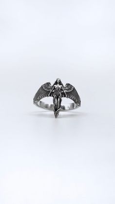 Sterling Silver Angel Ring, Religious Ring, Christian Culture Jewelry, Mythology Lovers Gift, Handmade Antique Jewelry, Christian Ring Elevate your style with our Silver Angel Ring, a timeless piece that embodies the serenity and grace of celestial beings. This ethereal ring features an intricately designed angel, creating a symbol of divine elegance that resonates with the spirit of hope and protection. The ring showcases a beautifully detailed angel, capturing the essence of celestial grace an Symbolic Handmade Stainless Steel Rings, Handmade Symbolic Stainless Steel Rings, Handmade Antique Jewelry, Christian Culture, Culture Jewelry, Christian Ring, Celestial Beings, Ethereal Jewelry, Angel Ring