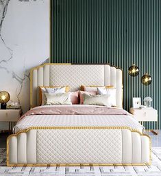 a large bed sitting next to a green wall with gold trimmings on it