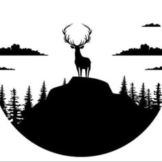 a deer standing on top of a hill with trees