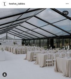 tables and chairs are set up in a tented area for an outdoor wedding reception